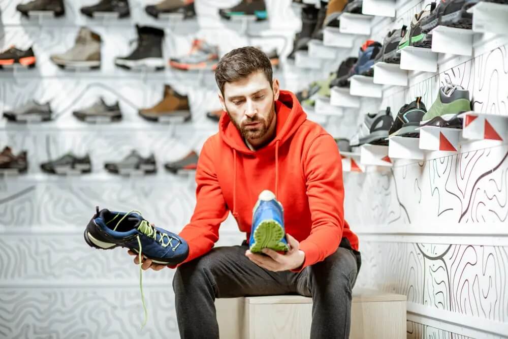 A man choosing running shoes